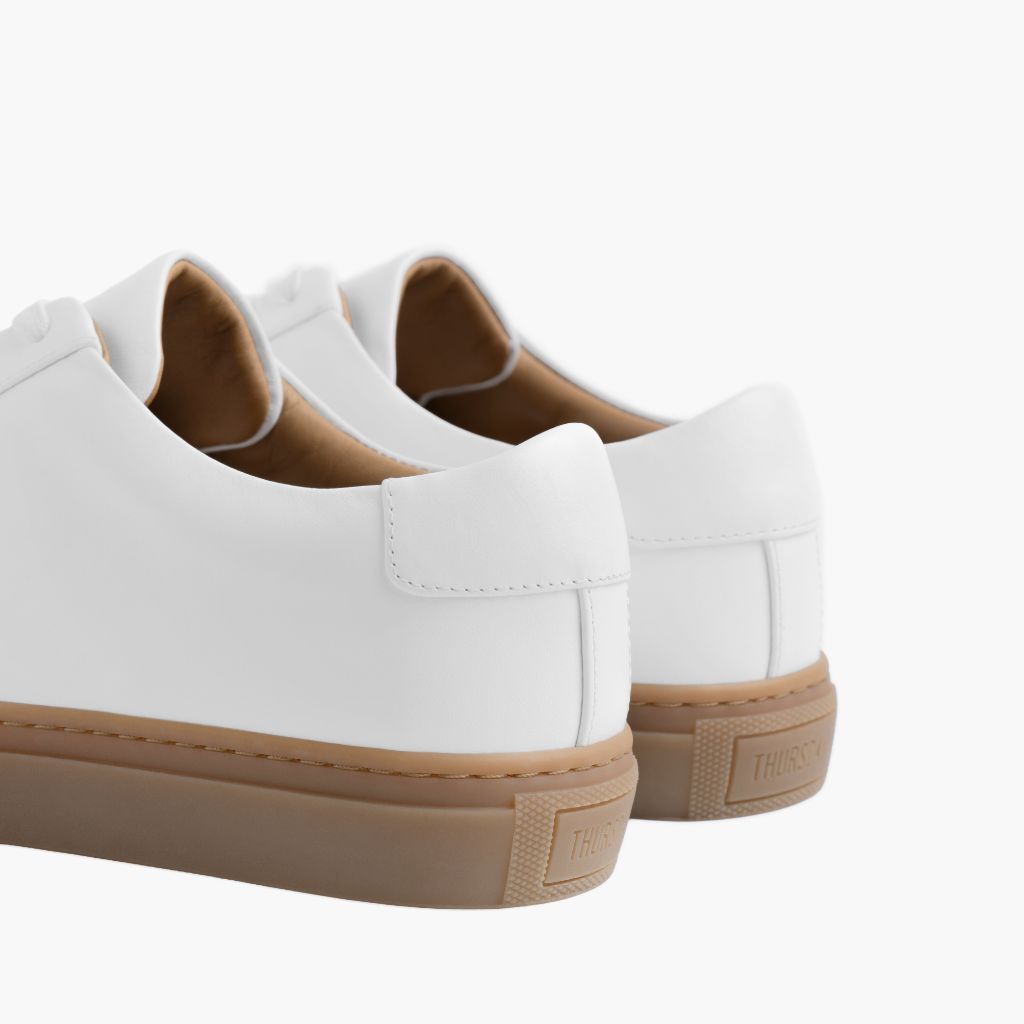 High-Traction Rubber Outsole & Lug Tread Pattern on Legacy White Atlete lëkure për Meshkuj
