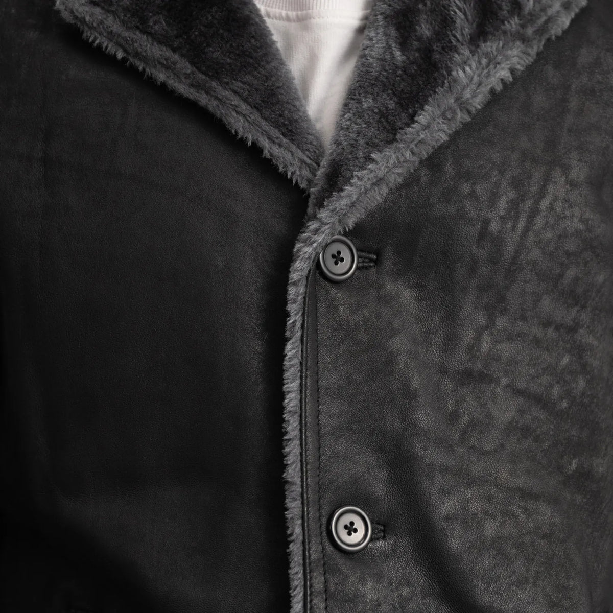 
Detaje nga afër of Notch & Button Hardware on Kolby Distressed Black Shearling Long Coat
