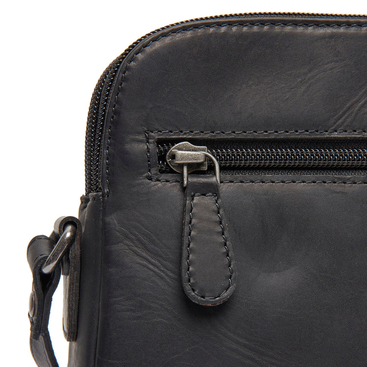 
Vionne Çantë crossbody lëkure - Profil anësor i strukturuar me thellësi dhe vëllim