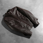 
Përpunim artizanal i buzës së poshtme Rumella Maroon Leather Biker Jacket