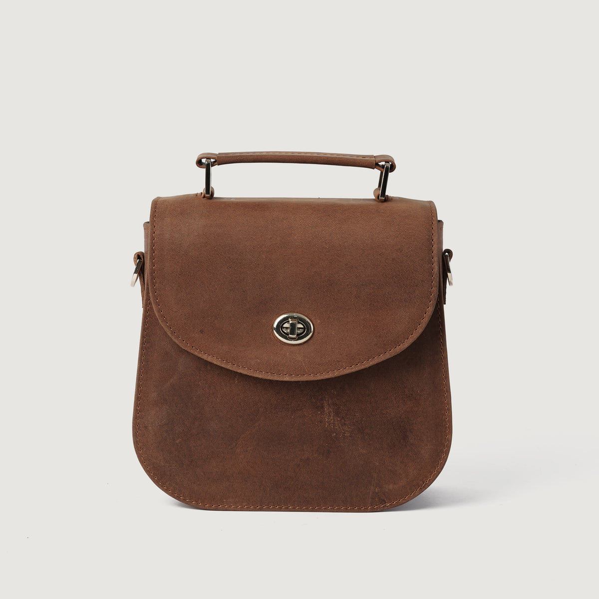 
The Sandra Vintage Kafe e çelët Leather Saddle Bag For Women - Profil anësor i strukturuar me thellësi dhe vëllim