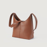 
The Stefani Brown Leather Hobo Bag For Women - Pamje anësore me prerje ergonomike të mëngëve
